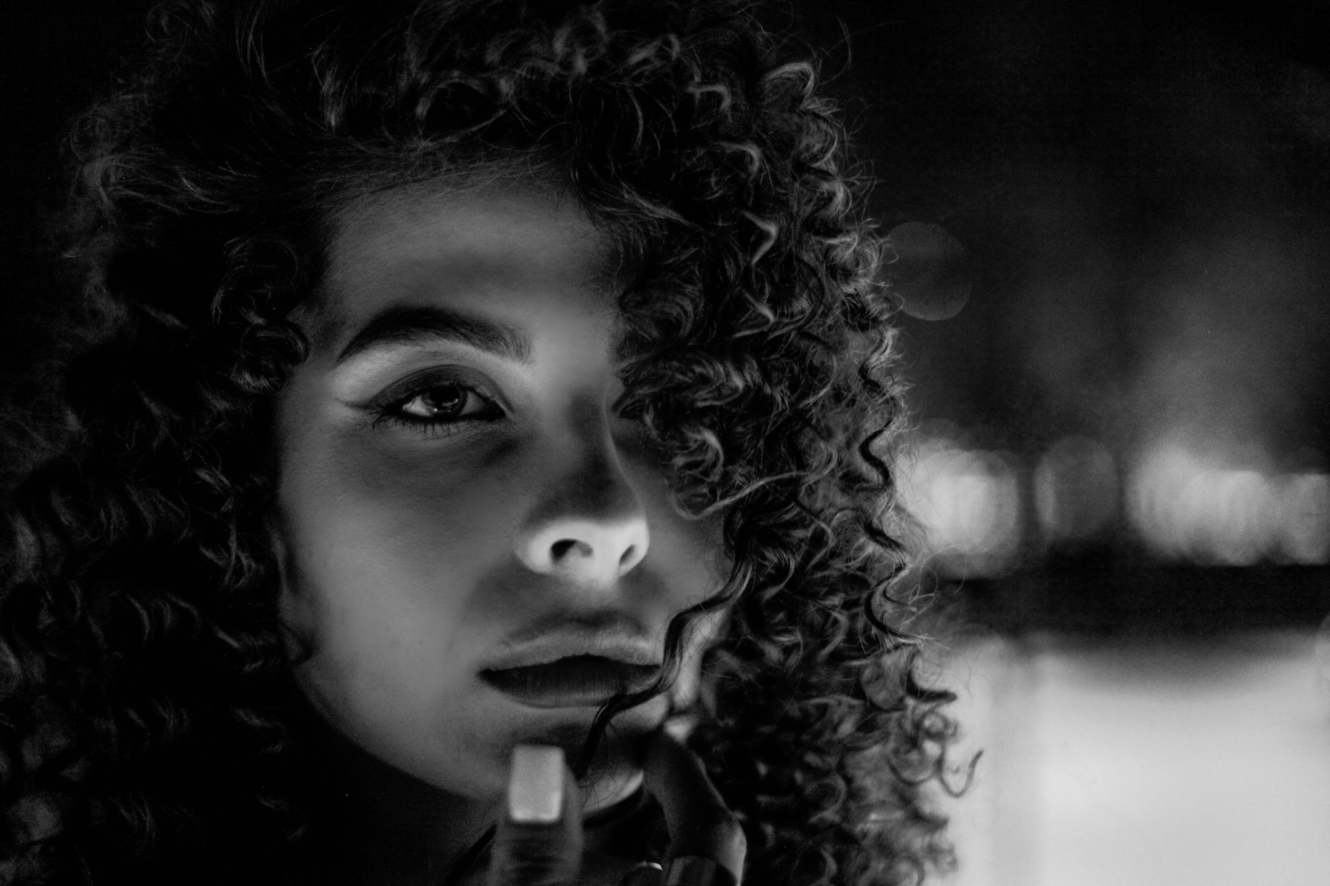 a woman with curly hair